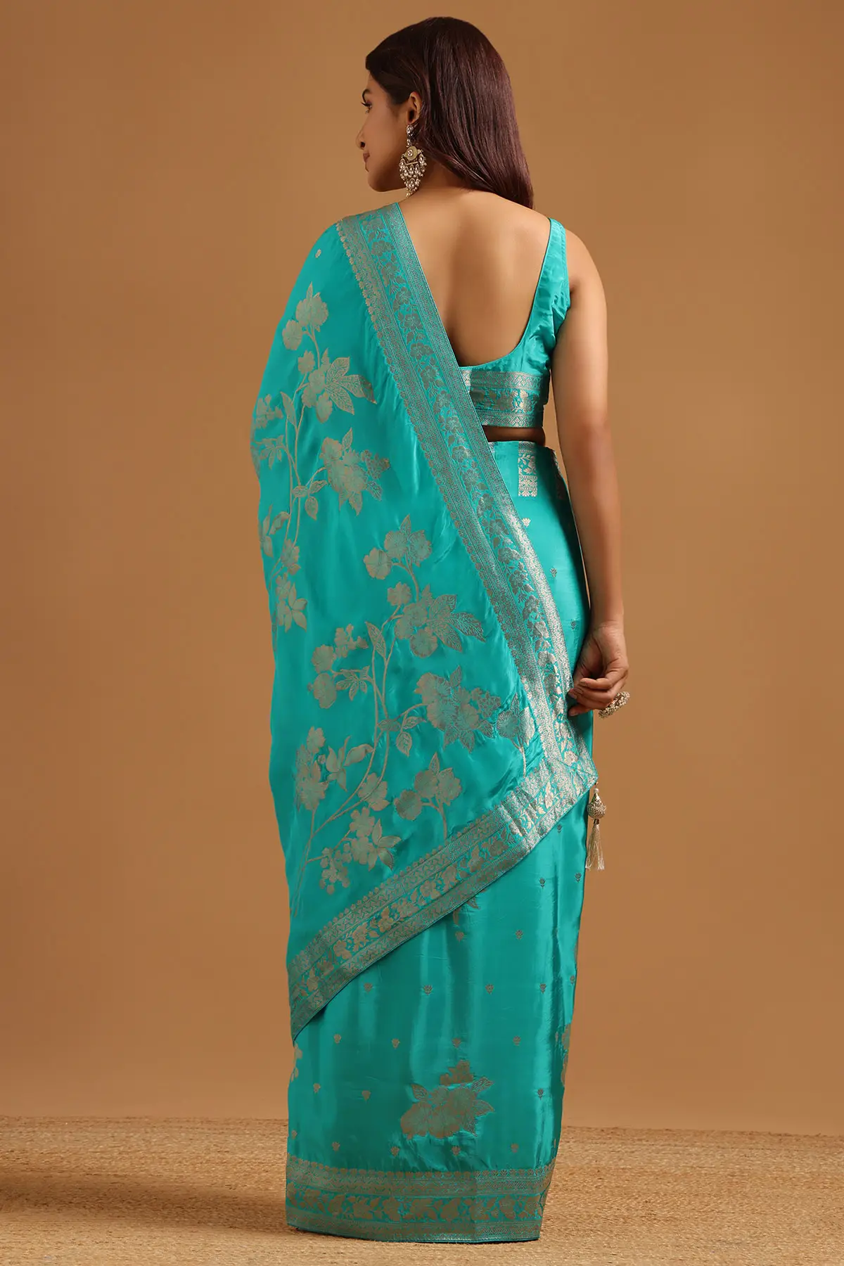 Turquoise Blue Crepe Floral Zari Woven Saree
